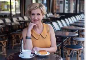 Kelly at table/planning new year business goals